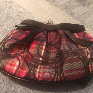 Coach. Brand new. Never used. Change purse